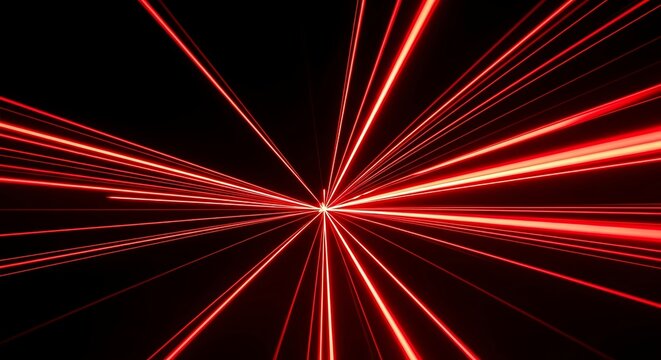 Abstract red light streaks exploding outward from a central point on black background