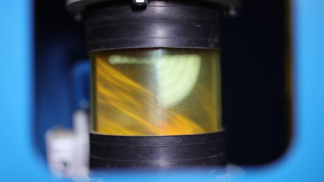 Turmeric powder grinding in a machine, slow motion scene for a corporate film in a factory, haldi powder 