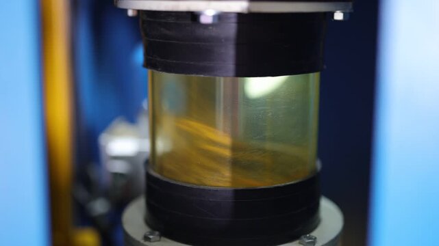Turmeric powder grinding in a machine, slow motion scene for a corporate film in a factory, haldi powder 