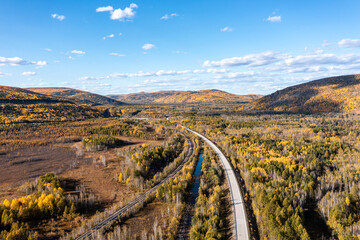 Aerial photography of autumn mountain forest road in Daxing'an Mountains