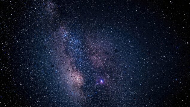 Closeup of the Milky Way galaxy featuring stars and cosmic dust, showcasing the vastness of space
