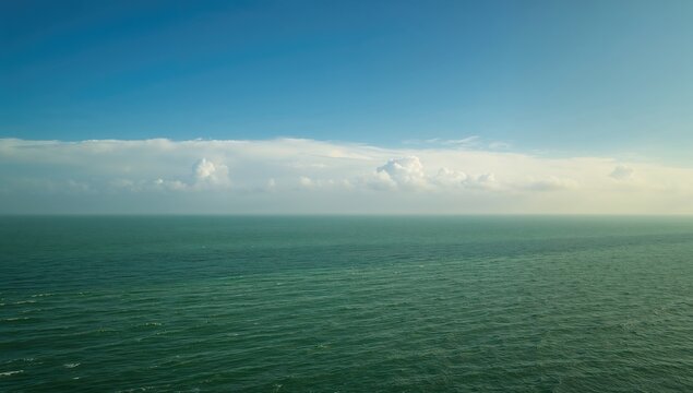 Fototapeta Emerald Ocean and Ivory Skies, seasonal change