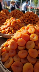 Dried Apricots Displayed at Farmers Market, Close Up View.