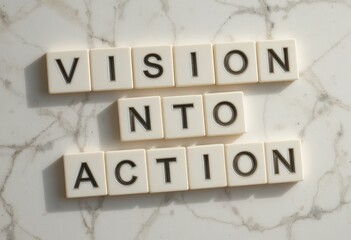 Obraz premium Vision to Action Motivational Quote on Marble Background with Letter Tiles