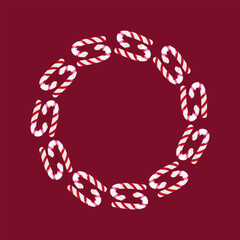 A round frame with Christmas candy canes on a red background. The frame features cinnamon sticks and a white candy cane with red stripes. Perfect for Christmas cards, posters, and banners