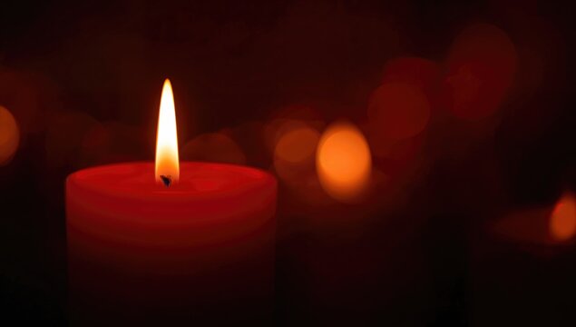 Bokeh backdrop featuring a glowing red candle, ideal for atmospheric text layouts