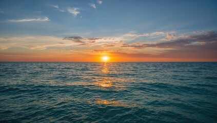 A serene sunset over water with vibrant sky colors, ideal for relaxation and appreciation of nature