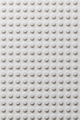 Obraz premium White LEGO Baseplate Top View Seamless Pattern