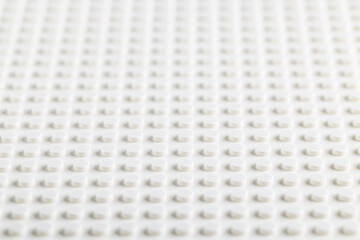Naklejka premium White LEGO Baseplate Top View Seamless Pattern