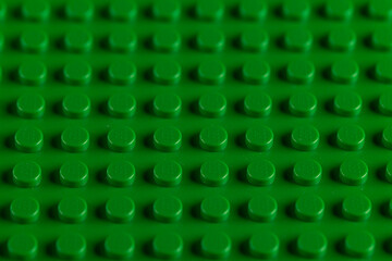 Obraz premium Vibrant Green LEGO Baseplate Top View Seamless Pattern