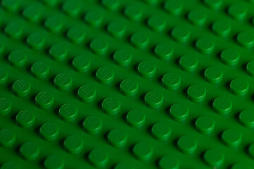 Obraz premium Vibrant Green LEGO Baseplate Top View Seamless Pattern