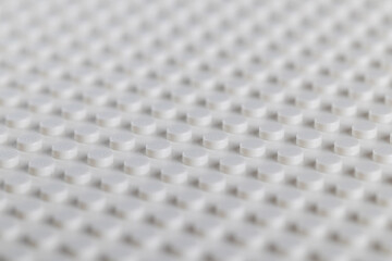 Fototapeta premium White LEGO Baseplate Top View Seamless Pattern