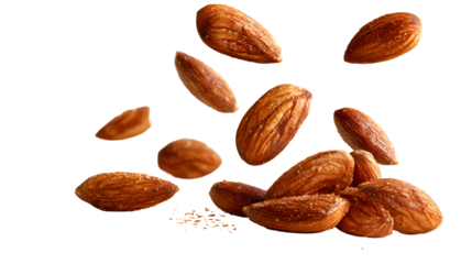 Scattered almonds falling and tumbling in mid air isolated on transparent background