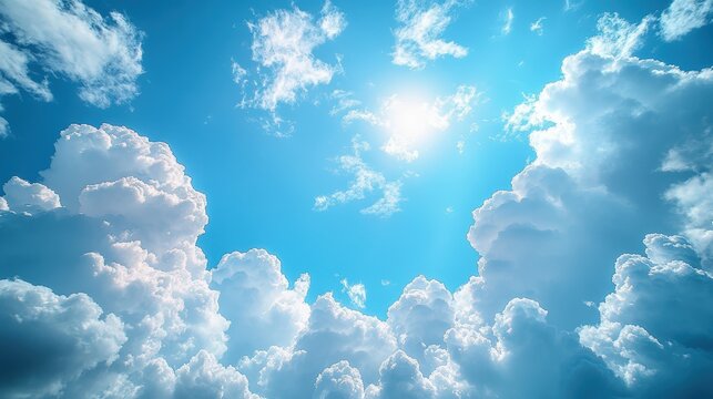 A bright sky filled with fluffy white clouds and a shining sun, creating a serene and uplifting atmosphere.