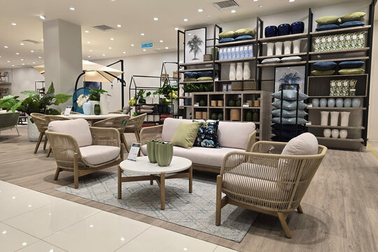 Kuala Lumpur, Malaysia &ndash; Sep 14, 2025: Interior view of a Harvey Norman furniture store showcasing a modern and elegant living room setup, the design emphasizes comfort, style and home decor trends.