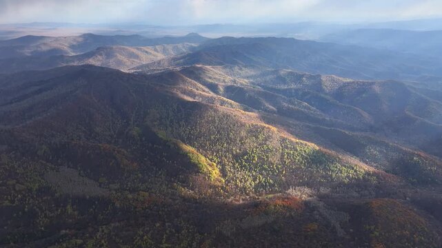 God Rays Over Autumn Mountain Forest