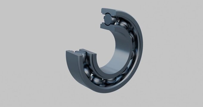 Close up view of a single row, deep groove ball bearing with a cross sectional view of the inner race, outer race and steel cage 