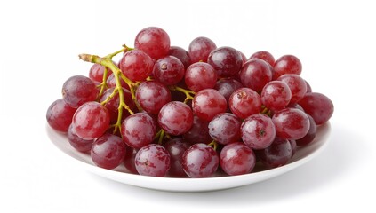 Fototapeta premium A collection of red grapes with stems arranged on a plate, fiber-dense choice