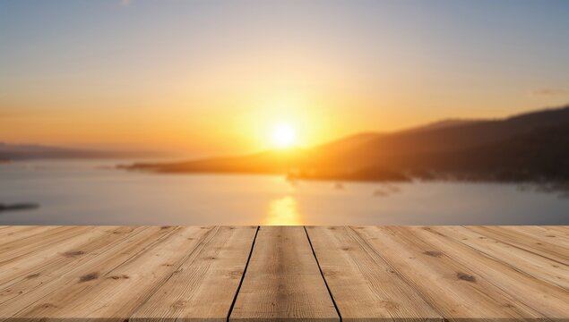 Unfocused abstract backdrop featuring a blank wooden surface, a table, and a tabletop with a vibrant sun setting or rising over mountainous coastal scenery. Space for text included.