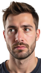 Fototapeta premium Young man with short brown hair and beard, looking thoughtfully to side, conveying sense of contemplation and curiosity