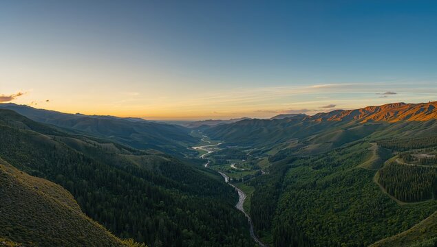 A panoramic mountain valley illuminated by contrasting twilight