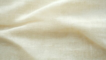close-up of soft beige fabric with natural textured weave and gentle folds creating a calm and warm atmosphere