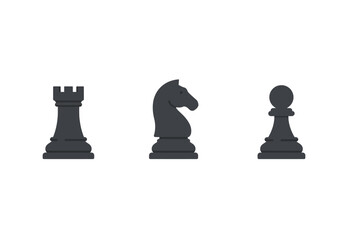 Three black chess pieces rook knight and pawn on a white background