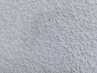Fototapeta premium Create elegant designs with this cool white textured wall background for websites and advertising