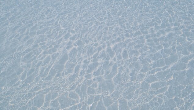 The white sandy beach with tropical blue ocean, ideal for summer leisure activities and relaxation - Powered by Adobe