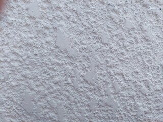 Textured stucco wall background, a blank white canvas for your creative designs and architectural projects