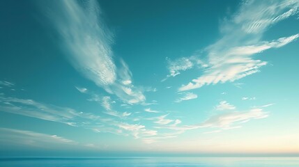 Obraz premium A serene vista of sea meeting sky under a canopy of scattered fluffy clouds above