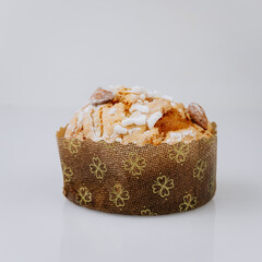 Mini Christmas panettone with sugar almonds, isolated festive dessert on white