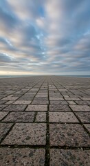 Expansive Paved Surface Under a Dramatic Cloudy Sky.