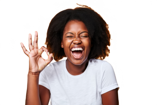 Happy young woman with curly hair in white t-shirt showing peace sign, smiling brightly, isolated on transparent background. Positive portrait