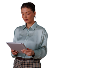 Businesswoman standing, holding tablet, focusing on screen for work and data analysis with transparent background