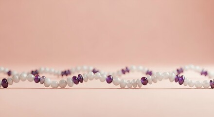 Delicate floral garland with purple accents on a soft pink background