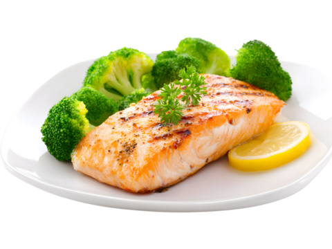 Grilled salmon fillet with steamed broccoli and lemon slices isolated on white background, symbolizing healthy diet and balanced meal.