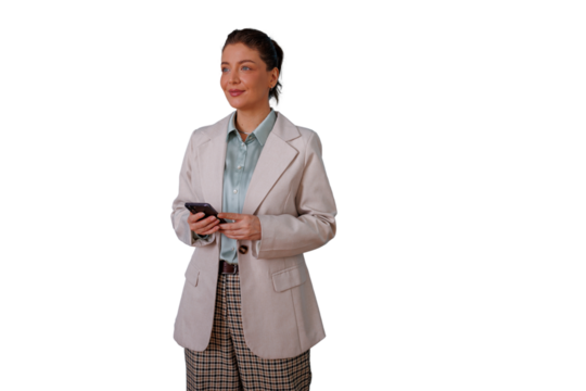 Businesswoman standing, holding smartphone, smiling and looking away on transparent background, contemplating future