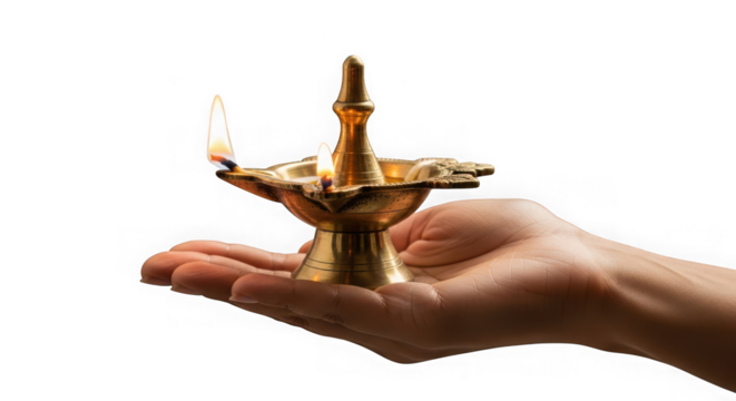 Hand holding traditional brass diya lamp with flickering flame