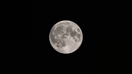 Obraz premium Black background featuring a full moon, creating a dramatic night sky atmosphere