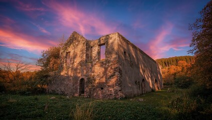 Remnants of ancient ruins in a rural setting, highlighting erosion risk