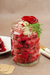 Fermented beetroot pasta salad in a jar with sliced beets. Probiotics and healthy plant-based eating