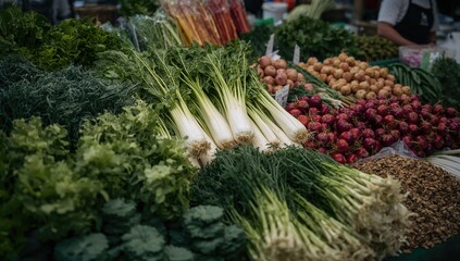 Fototapeta premium Freshly harvested vegetables and greens displayed at a market stall, fiber-dense choice