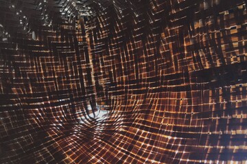 Abstract warm red woven texture background with glowing light patterns. Perfect for modern design, presentation backdrops, posters, digital artwork, web graphics, and creative branding use.