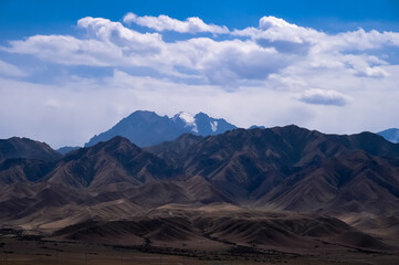 Naklejka premium The distant snow-capped mountains