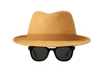 Straw fedora hat and sunglasses creating invisible man concept