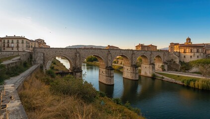 Obraz premium Roman bridge structure with historical significance, erosion risk