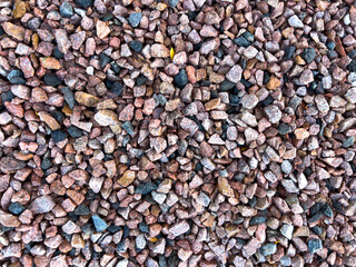Close up of multicolored gravel ground texture