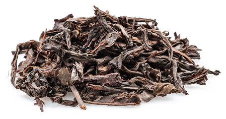 Heap of dried tea leaves isolated on white background. Closeup.