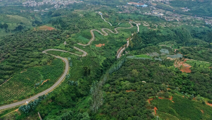 Aerial view of the winding road in the mountains